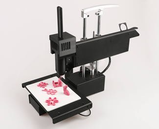 The Bocusini uses cartridges loaded with printable food together with a wireless user interface that can be used on tablets and smartphones to create 3D printed food items ready to use.