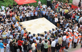 An eight ton tofu was unveiled at a cultural festival in Huainan, central China. The World's Largest piece of tofu measured close to 12 feet by 12 feet and was just over a foot tall. 