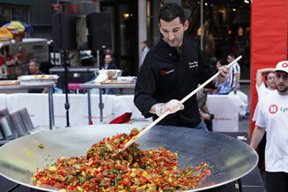 LycoRed celebrated its 20-year anniversary during National Tomato Month with a Guinness World Record for the largest display of tomato varieties in Times Square New York. LycoRed displayed more than 130 varieties of tomatoes. In addition to its display of tomato varieties, a giant tomato salad was constructed by the LycoRed team and Chef Donny Rogoff in a giant wok on a stage in the middle of Times Square. It was made with heirloom cherry tomatoes with a red wine citrus vinaigrette.