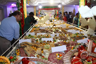 World's Longest Cold Meat Platter was made by 100 Chefs in 800 man hours with 300 Kgs of meats. This was presented on the occasion of Christmas celebrations by Culinary Academy of India. Chef Sudhakar N. Rao mentioned that for the above Platter chefs used Turkey, Fish, Prawns, Chicken, Lobster Vegetables & Fruits.