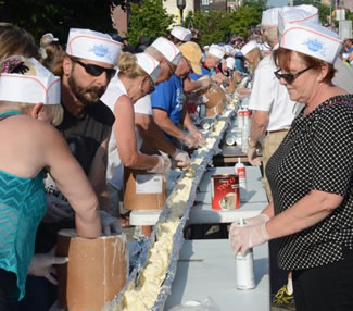 An estimated 15,000 people gathered in the West Michigan community of Ludington on Saturday, June 11 in an attempt to break the Guinness World Record for longest ice cream dessert.