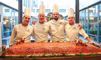 This team of chefs created the world's largest one-piece meat pie. The pie was 160cm long, 78cm wide and 11cm high.