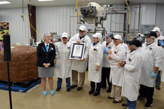 Sweet Shop USA had to beat a truffle weighing 1,768 pounds and 2 ounces. The company trounced the old record and weighed in their truffle at 2,368.5 pounds.