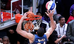 JaVale McGee sets world record for the most basketballs dunked in a single jump 