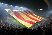 the world's largest flag flying in a football stadium Barcelona