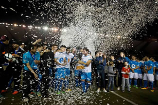 Soccer players celebrates after finishing a 120 hour match at Bicentenario stadium in Santiago, Chile, Sunday, May 22, 2016. Chile officially won a world record after 2,357 people took turns to play a match that lasted for 120 hours.