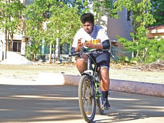  P.K. Arumugam, from Chennai, has smashed the Guinness World record for solving Rubik's Cubes while cycling by managing 1,010 of the mind-bending puzzles while on two wheels; he cycled for six hours and seven minutes last weekend to beat the standing record of 751 cubes solved in seven hours, two minutes.
