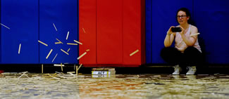 A group of Natick High School students set off a stick bomb with nearly 70,000 sticks in the school's gym ? shattering the existing Guinness World Record of 40,910 sticks. It lasted fewer than 30 seconds, but took two-dozen students nearly 24 hours to build. 