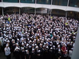 most people wearing paper hats Manor High School