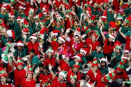 As many as 1,792 of Santa's little helpers, aged between nine and 15, donned red, green and white hats, matching T-shirts and pointy plastic elf ears, clustered into the shape of the word "Siam", the former name of the Southeast Asian country, as they broke the Guinness World Recods world record for the largest gathering of Christmas elves, according to the World Record Academy: www.worldrecordacademy.com/.