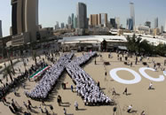  The largest human letter consists of 910 participants and was achieved by KOC company (Kuwait) in Kuwait City, Kuwait. The participants formed the letter K. 
