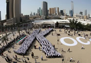 The largest human letter consists of 910 participants and was achieved by KOC company (Kuwait) in Kuwait City, Kuwait. The participants formed the letter K.
