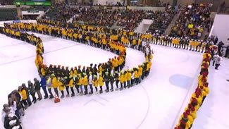  Five-hundred and ninety-three State University of New York at Oswego students laced up their ice skates to break the world record for the longest conga line on ice. 