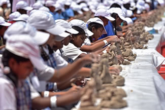 A total of 3,082 children from 160 schools in the Pune Municipal Corporation limits were part of the biggest workshop held in Pune; they made 3,082 Ganesha Idols, thus setting the new world record for the Most students making Ganesha Idols in one place, according to the World Record Academy.