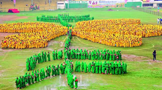 About 3,000 women clad in yellow and greensaris had formed the shape of a Thangedu, thus setting the new world record for the Largest human thangedu flower, according to the World Record Academy.