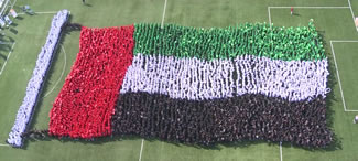 Over 4,130 students from GEMS Education schools in the UAE gathered to form the 'World's Largest Human Waving Flag' and set a world record. The students, from GEMS Cambridge International School - Abu Dhabi, and GEMS United Indian School, were all dressed in the National flag colors, creating an image of the country's flag waving.