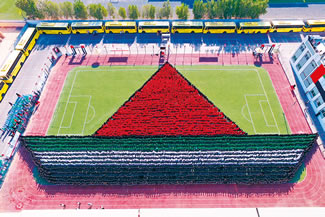 A total of 4,882 students from the India International School of the PACE Education Group entered the Book of World Records for creating the largest human image of a boat, according to the World Record Academy.