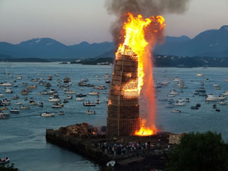 The world's tallest bonfire was measured by laser at 47.4 metres (155 ft), setting a new world record.