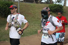 fastest marathon wearing a gas mask Staff Sgt. Marc Dibernardo