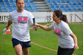 About 926 people ran 100m each, the total distance for the 12 hours being of 154 km on the Arch of Triumph National Rugby Stadium in Bucharest, Romania.