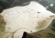 A fleet of Hyundai cars were used to send a sweet message from a teenager to her astronaut dad who is working at the International Space Station. Using 11 Hyundai Genesis sedans, stunt drivers helped create what Guinness called the world's largest tire track image -- spelling out "Steph Loves You!" in Nevada's Delamar Dry Lake. The image measured 59,808,480.26 square feet and was able to reach Stephanie's father in space.