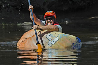 Todd Sandstrum, 42, climbed into the 817-pound pumpkin and paddled 3.5 miles down the Taunton River.
