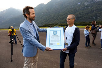 On behalf of the World Record Academy, the world's largest certifying organization, the new world record was verified & certified 'on-the-spot' by Mr. Cattaneo Gianni (left), a Lugano-based attorney-at-law at "Cattaneo & Postizzi".