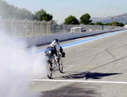 Swiss cyclist Francois Gissy has clocked 207 miles per hour on a bicycle, breaking the world speed record for bicycles. He covered a quarter mile in less than seven seconds on a rocket-powered bicycle designed by his friend Arnold Neracher, breaking his own record set last May.