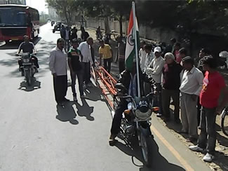  Bharat Sinh Parmar, 30, from Gujarat, modified a traditional two wheeler - stretching it to a length of 26.29 metres, making it the World's longest motorcycle.