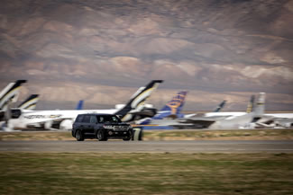  A Toyota Land Cruiser has become the fastest SUV in the world after clocking 230mph on a 2.5-mile runway at the Mojave Air and Space Port in California. Piloted by former NASCAR driver Carl Edwards, the heavily modified Land Cruiser added 19mph to the previous benchmark set by the Brabus Bi-Turbo V12 GLK, which has a top speed of 211mph.