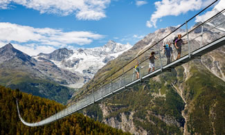  The Charles Kuonen Suspension Bridge, in the Swiss Alps, near the village of Randa, is a record-breaking 494 metres long and connects Grächen and Zermatt on the Europaweg foot trail.